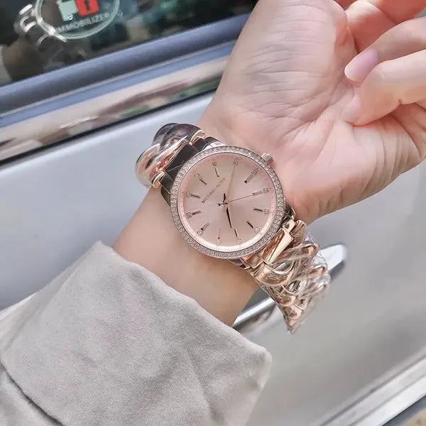 Michael Kors Lady Nine MK3236 női karóra, rózsaarany acél, 35 mm, WR50