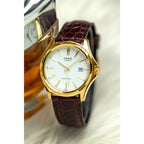 Casio MTP-1183Q-7ADF férfi karóra, arany tok, fehér számlap, barna bőr, 38 mm
