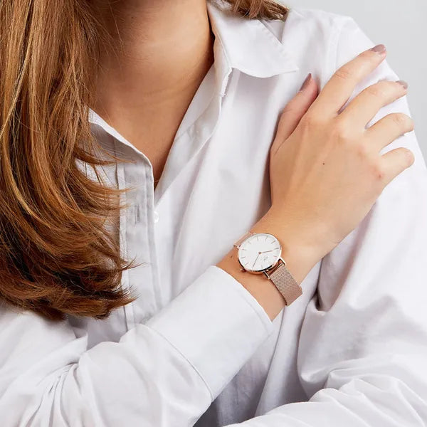 Daniel Wellington Petite Melrose női karóra, 32 mm, rózsaarany, fehér számlap