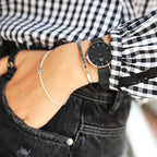 Daniel Wellington Petite női karóra, 32 mm, fekete számlap, ezüst tok, kvarc