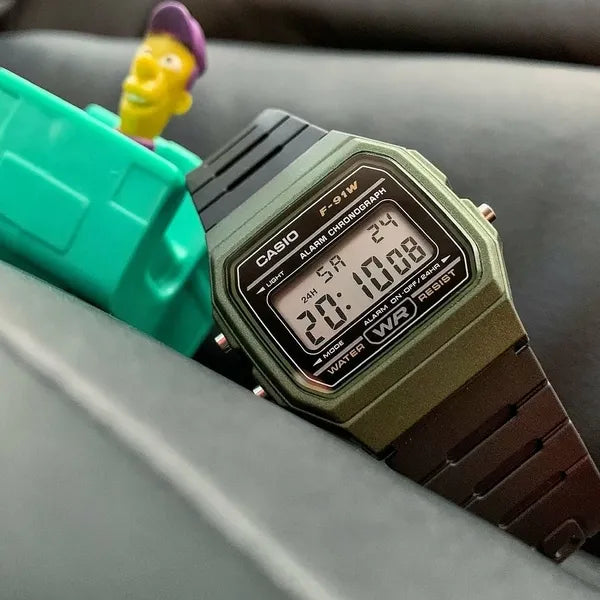 Casio F-91WM-3AER férfi digitális karóra, zöld tok, fekete szíj, WR100