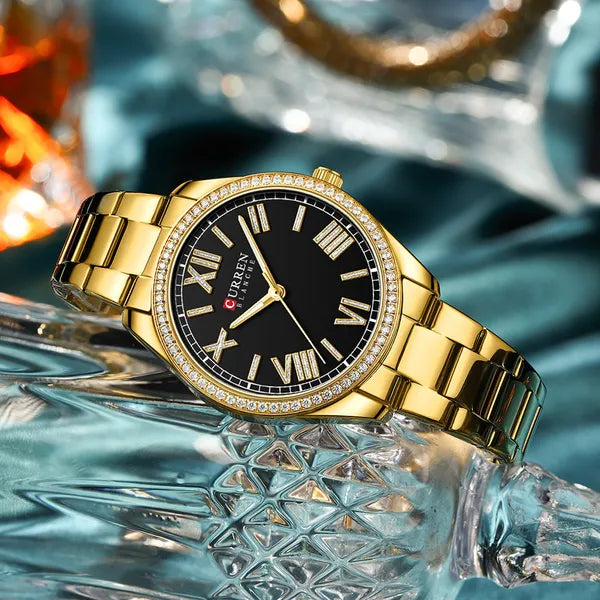 Curren 9088 női kvarc karóra, 36 mm, fekete számlap, arany fém szíjjal, dobozzal