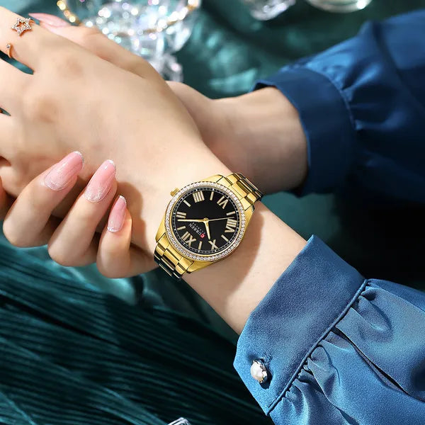 Curren 9088 női kvarc karóra, 36 mm, fekete számlap, arany fém szíjjal, dobozzal