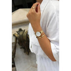 Daniel Wellington női óra DW00100350 Petite Evergold 28 mm, arany, fehér számlap
