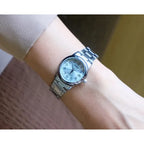 Casio női karóra LTP-V002D-2B, ezüst acél szíj, türkiz számlap, dátum
