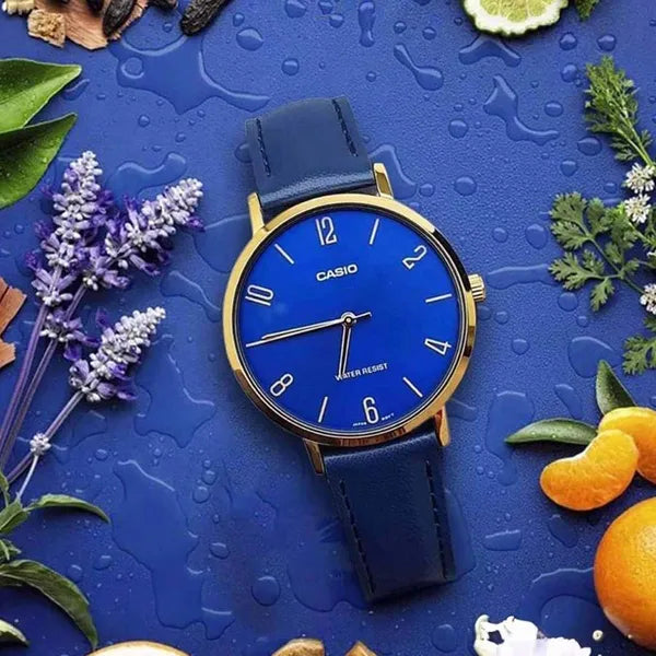 Casio női karóra, kvarc, 34 mm, arany tok, kék bőrszíj, WR30, díszdoboz
