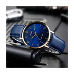 Casio női karóra, kvarc, 34 mm, arany tok, kék bőrszíj, WR30, díszdoboz