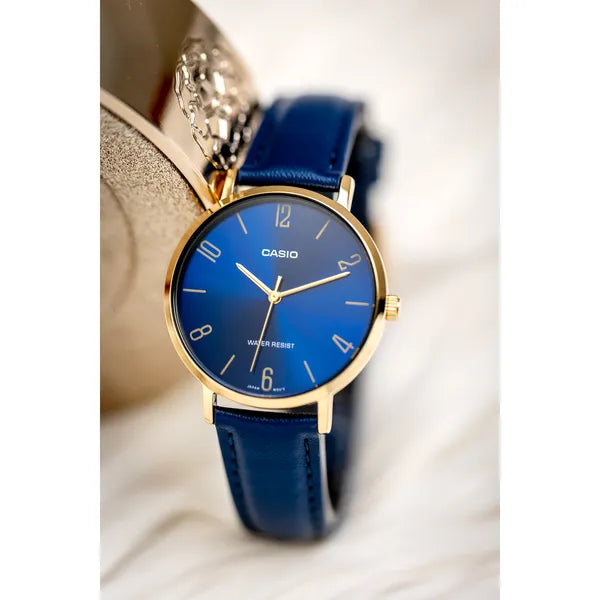 Casio női karóra, kvarc, 34 mm, arany tok, kék bőrszíj, WR30, díszdoboz