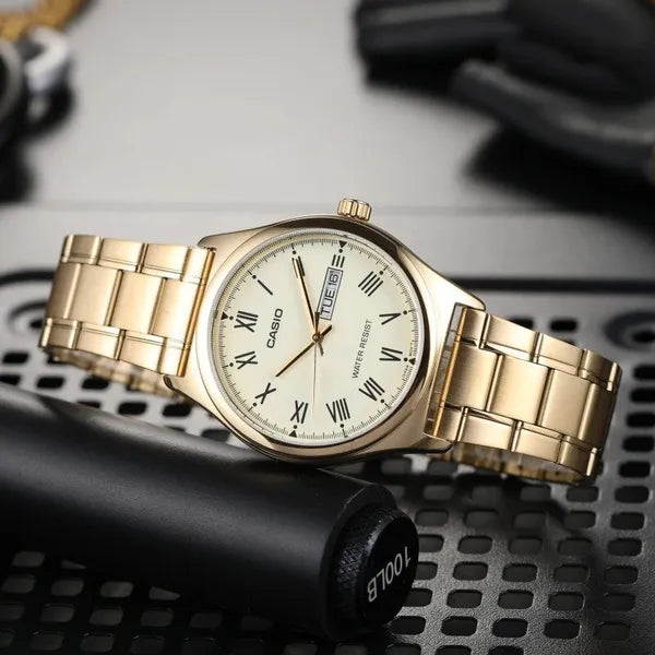 Casio MTP-V006G-9B férfi karóra, arany acél szíj, 38 mm, sárga számlap