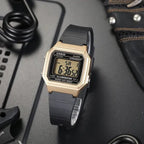 Casio W-217HM-9A uniszex digitális karóra, arany tok, fekete szíj, WR50, doboz