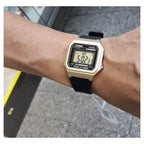 Casio W-217HM-9A uniszex digitális karóra, arany tok, fekete szíj, WR50, doboz