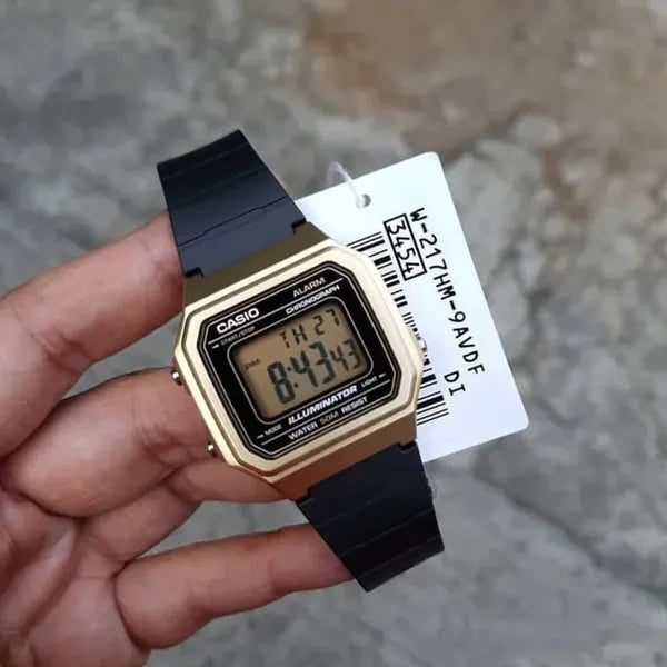 Casio W-217HM-9A uniszex digitális karóra, arany tok, fekete szíj, WR50, doboz