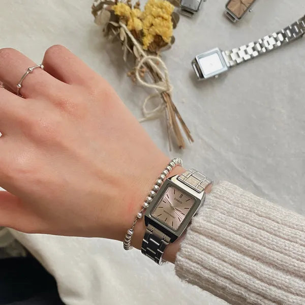Casio LTP‑V007D‑4E női karóra, rózsaszín számlap, acél szíj, téglalap, WR50