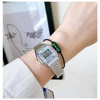 Casio LA680WA-2C női digitális karóra, acél szíj, türkiz számlap, WR30
