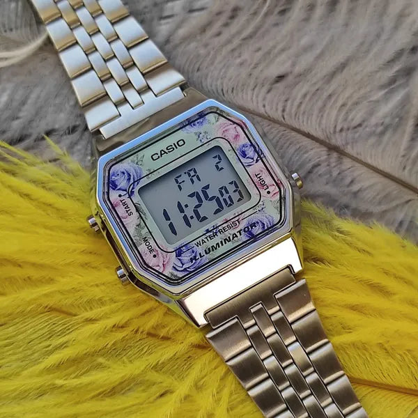 Casio LA680WA-2C női digitális karóra, acél szíj, türkiz számlap, WR30
