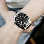 Casio MTD-135D-1A férfi karóra, fekete számlap, acél szíj, WR50, díszdobozzal