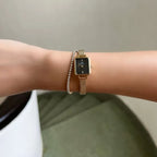 Daniel Wellington Quadro Mini DW00100652 női karóra 15 mm, arany/fekete, kvarc