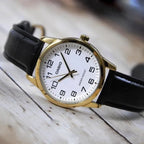 Casio MTP-V001GL-7B férfi karóra, arany tok, fehér számlap, fekete bőr szíj
