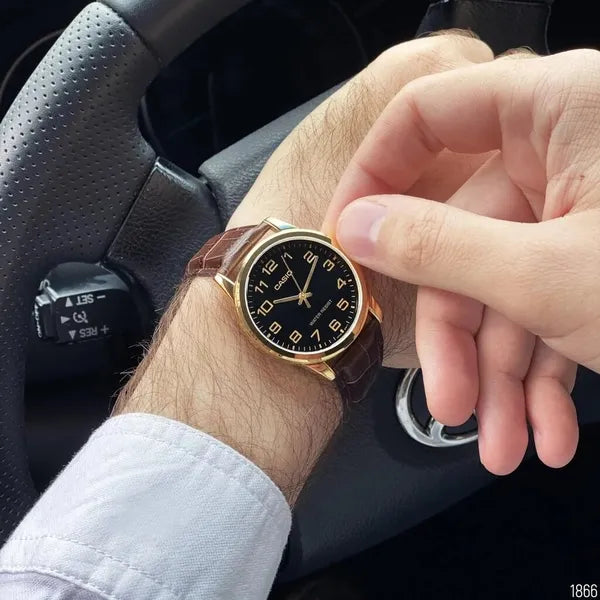 Casio férfi karóra MTP-V001GL-1B, fekete számlap, barna bőrszíj, arany tok