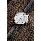 Casio MTP-V004GL-7A férfi karóra, arany tok 42 mm fehér számlap, bőr szíj, kvarc